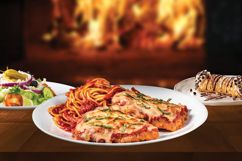 chicken parmesan, salad, and a cannoli